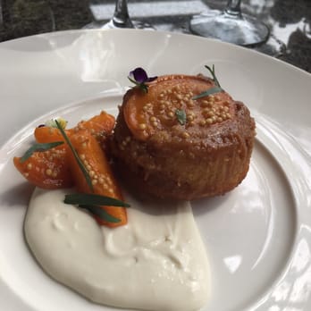 A.R. Valentien - Upside down peach cake...it was ok...maybe it was the goat cheese creamy sauce I wasn't a fan of. - New American Near Me - La Jolla, California