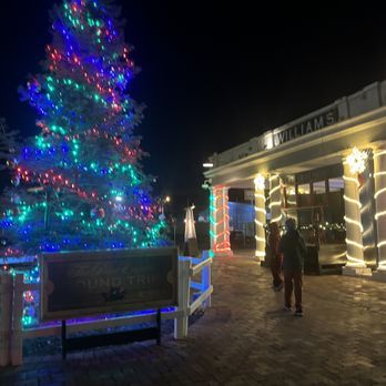 Grand Depot Cafe - a lighted christmas tree in front of the grand depot - American Near Me - Williams, Arizona