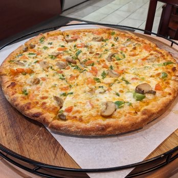 Omar's Indian Fine Cuisine - Tawa vegetable pizza - Indian Near Me - Brooklyn, New York Omar's Indian Fine Cuisine - Tawa vegetable pizza - Indian Near Me - Brooklyn, New York