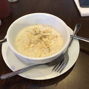 Maiwand Grill - Rice pudding with a pinch of cardamom, pistachios and almonds. - Afghan Near Me - Baltimore, Maryland Maiwand Grill - Rice pudding with a pinch of cardamom, pistachios and almonds. - Afghan Near Me - Baltimore, Maryland