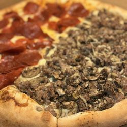 Skipolini's Pizza - 1/2 The Black and White Pizza xtra sausage- 1/2 Pepperoni