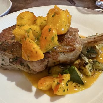 Carthay Circle Restaurant - Signature Thick Cut Pork Chop* - New American Near Me - Anaheim, California Carthay Circle Restaurant - Signature Thick Cut Pork Chop* - New American Near Me - Anaheim, California