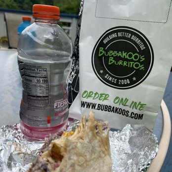 Bubbakoo's Burritos - 3 bites taken, 3 bites to go. - Tacos Near Me - Linthicum Heights, Maryland Bubbakoo's Burritos - 3 bites taken, 3 bites to go. - Tacos Near Me - Linthicum Heights, Maryland