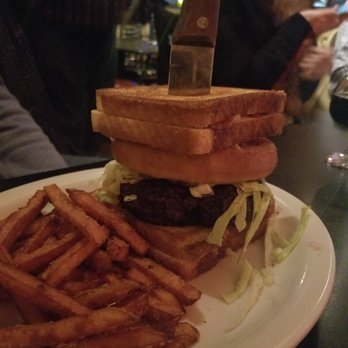 Strange Brew Tavern - This burger is sandwiched between two grilled cheese sandwiches. - Bars Near Me - Allentown, Pennsylvania Strange Brew Tavern - This burger is sandwiched between two grilled cheese sandwiches. - Bars Near Me - Allentown, Pennsylvania