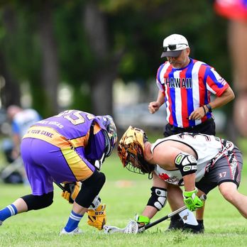 Jonny Vegas Entertainment - Jonny Vegas facing off against PLL pro Jerry Ragonese in the 2018 Hawaii Lacrosse Invitational. - Event Photography Near Me Jonny Vegas Entertainment - Jonny Vegas facing off against PLL pro Jerry Ragonese in the 2018 Hawaii Lacrosse Invitational. - Event Photography Near Me
