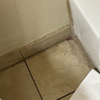 Comfort Suites - Weird stain on floor in bathroom - Hotels Near Me - Southfield, Michigan