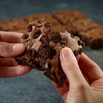 Papa Johns Pizza - a hand holding a chocolate cookie - Pizza Near Me - Allentown, Pennsylvania Papa Johns Pizza - a hand holding a chocolate cookie - Pizza Near Me - Allentown, Pennsylvania