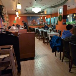 people sitting at tables people sitting at tables
