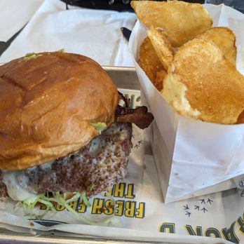 Crack’d Kitchen and Coffee - Homemade chips accompany the So-Cal Deluxe chicken sandwich. - Breakfast & Brunch Near Me - Plantation, Florida Crack’d Kitchen and Coffee - Homemade chips accompany the So-Cal Deluxe chicken sandwich. - Breakfast & Brunch Near Me - Plantation, Florida