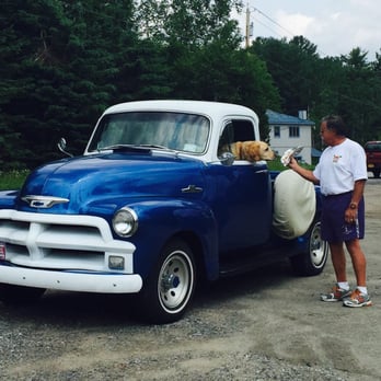 River Dogs - a man and his dog in the back of a truck - Food Trucks Near Me - Saranac Lake, New York River Dogs - a man and his dog in the back of a truck - Food Trucks Near Me - Saranac Lake, New York
