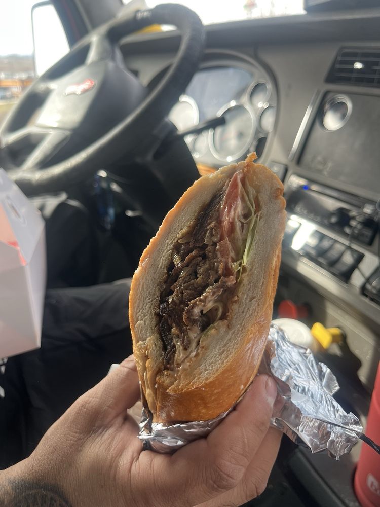 La Parada Del El Coqui Logo