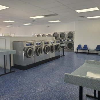 SpeedClean Coin Laundry - Lots of folding tables near the dryers. - Laundromat Near Me - Warren, Michigan SpeedClean Coin Laundry - Lots of folding tables near the dryers. - Laundromat Near Me - Warren, Michigan