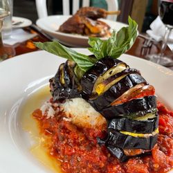 Back Porch Cafe - EggPlant! Although the menu does change weekly! Nevertheless So yummy! The Duck is in the background! All the flavors! :)