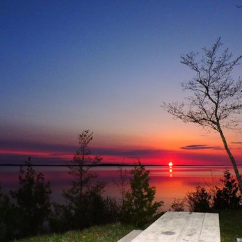 Oak Woods Lodge - Island sun set and sun rise views are only minutes away from Oak Woods Lodge. - Hotels Near Me - Beaver Island, Michigan Oak Woods Lodge - Island sun set and sun rise views are only minutes away from Oak Woods Lodge. - Hotels Near Me - Beaver Island, Michigan