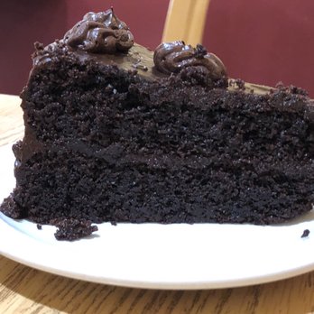 Loving Cafe - Chocolate cake. Decadent. Only improvement would be to heat it up a bit.... - Vegan Near Me - Fort Wayne, Indiana Loving Cafe - Chocolate cake. Decadent. Only improvement would be to heat it up a bit.... - Vegan Near Me - Fort Wayne, Indiana