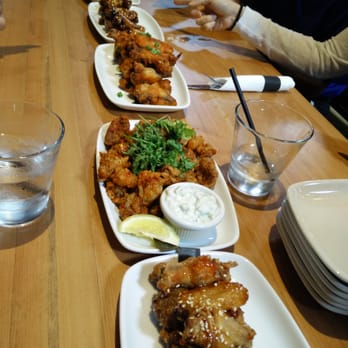 Match Eatery & Public House - Wings for days! And a plate of calamari snuck in there. - Canadian (New) Near Me - New Westminster, British Columbia Match Eatery & Public House - Wings for days! And a plate of calamari snuck in there. - Canadian (New) Near Me - New Westminster, British Columbia