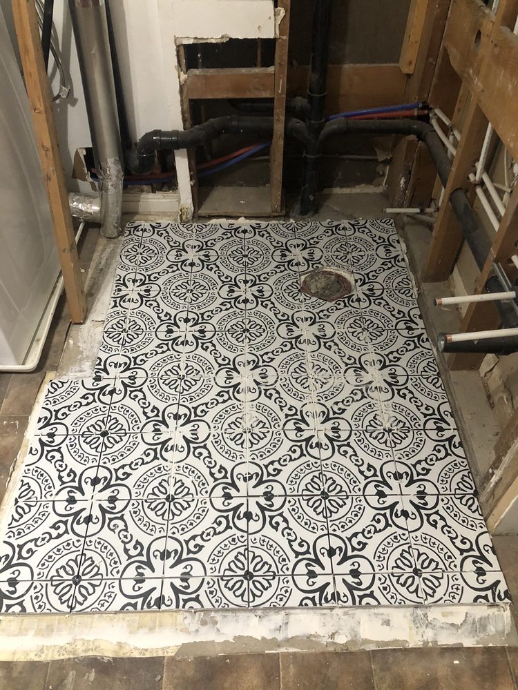 Slide of Big Johns Plumbing