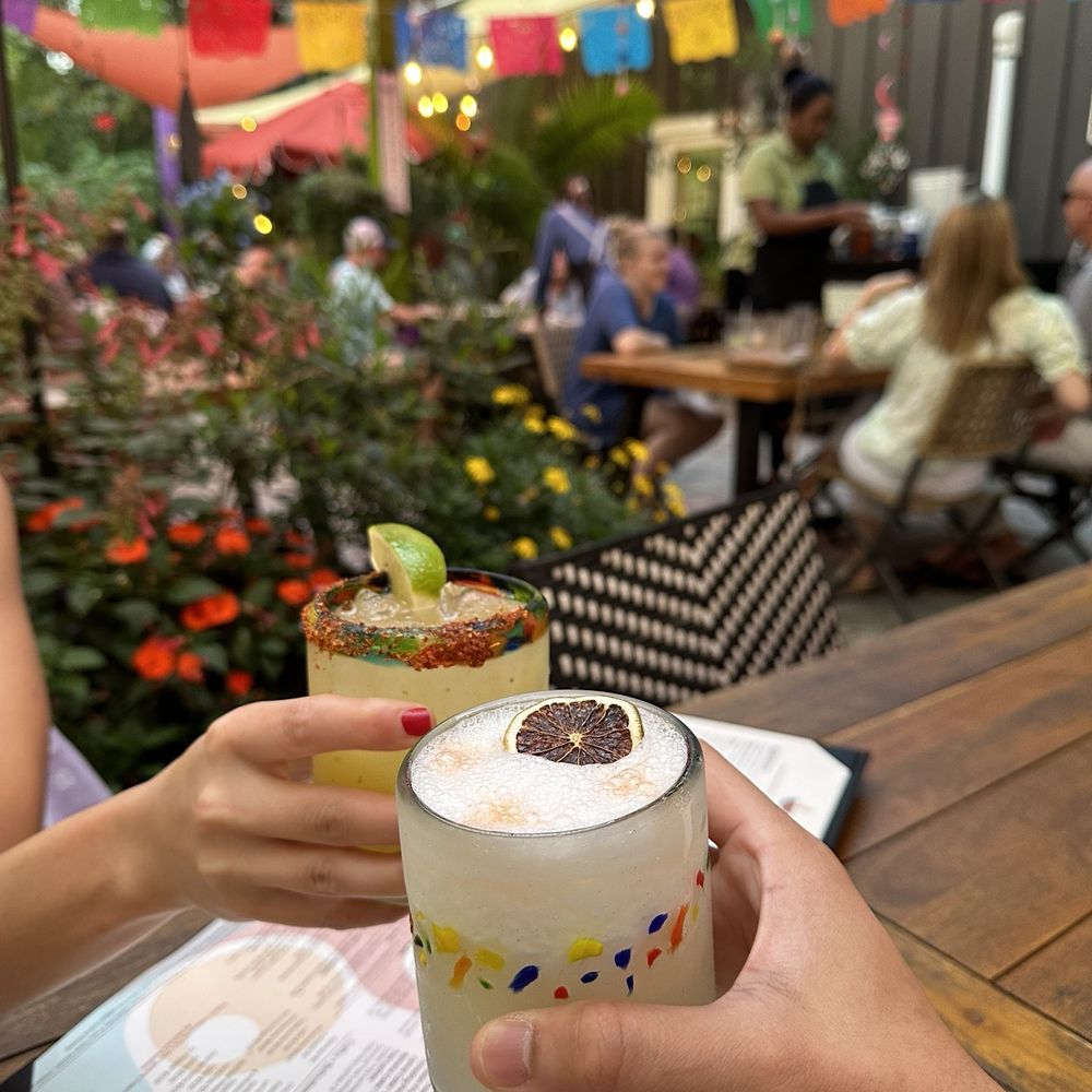 Cafe De Martin - The close one: Pisco sour The far one: Spicy Mango Margarita - Peruvian Near Me - Tallahassee, Florida Cafe De Martin - The close one: Pisco sour The far one: Spicy Mango Margarita - Peruvian Near Me - Tallahassee, Florida