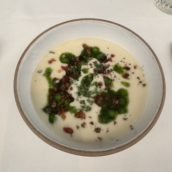 Hawks - Puree of potato and Parmesan soup with smoked bacon, English peas and parsley pistou - New American Near Me - Granite Bay, California Hawks - Puree of potato and Parmesan soup with smoked bacon, English peas and parsley pistou - New American Near Me - Granite Bay, California