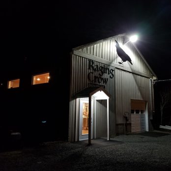 Raging Crow Distillery - a crow perched on the roof of the building - Distilleries Near Me - North River, Nova Scotia