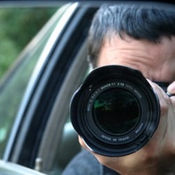 Panoramic Investigations - Photo of investigator performing surveillance activity.