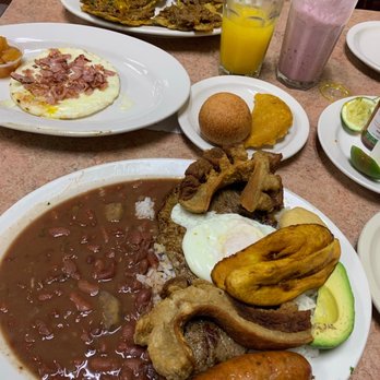La Casona Colombian Restaurant - Tostone con Carne Desmechada, Jugo de Agua, Jugo de Leche, Arepa Hawaiana, Buñuelo, Empanada, y Bandeja Paisa - Colombian Near Me - Atlanta, Georgia La Casona Colombian Restaurant - Tostone con Carne Desmechada, Jugo de Agua, Jugo de Leche, Arepa Hawaiana, Buñuelo, Empanada, y Bandeja Paisa - Colombian Near Me - Atlanta, Georgia