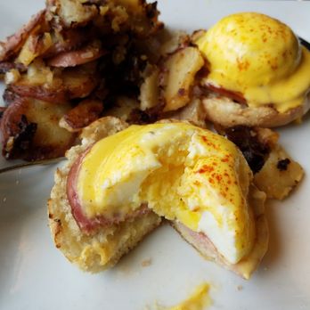 Keke's Breakfast Cafe - Eggs benedict with home fries - Breakfast & Brunch Near Me - Gainesville, Florida