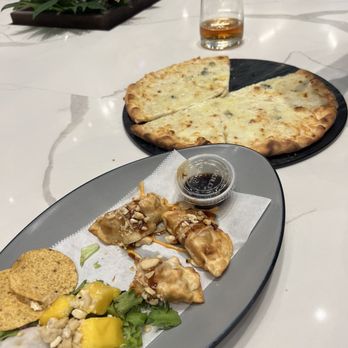 Julia & Henry's - 4 cheese white sauce pizza and chicken dumplings - Food Court Near Me - Miami, Florida Julia & Henry's - 4 cheese white sauce pizza and chicken dumplings - Food Court Near Me - Miami, Florida