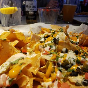 Dave & Buster's Manchester - DELICIOUS CHICKEN NACHO'S - Sports Bars Near Me - Manchester, New Hampshire Dave & Buster's Manchester - DELICIOUS CHICKEN NACHO'S - Sports Bars Near Me - Manchester, New Hampshire