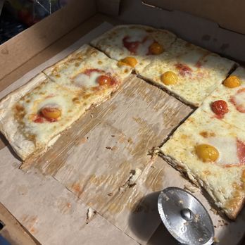 Lisi Italian - cheese with 1/2 cherry tomato - Italian Near Me - Pinehurst, North Carolina