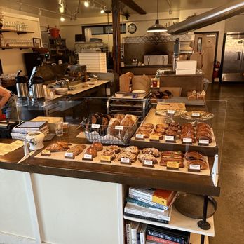 Babcia Bread - a bakery counter with a variety of baked goods - Bakeries Near Me