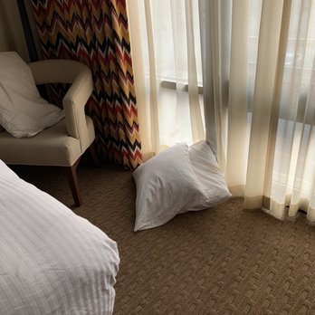 Hotel 43 - House cleaning left room with bed pillows on the floor. - Hotels Near Me - Boise, Idaho Hotel 43 - House cleaning left room with bed pillows on the floor. - Hotels Near Me - Boise, Idaho