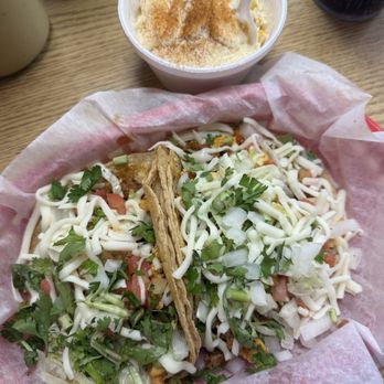 Arturo's Tacos - Chicken/chorizo tacos - Mexican American style, and an elote cup. - Tacos Near Me - Grand Haven, Michigan Arturo's Tacos - Chicken/chorizo tacos - Mexican American style, and an elote cup. - Tacos Near Me - Grand Haven, Michigan