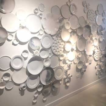 The Table at Crate - Wall art – wall of white plates - New American Near Me - Oak Brook, Illinois