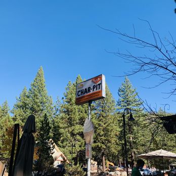Char-Pit - a sign in the middle of a wooded area - American Near Me - Kings Beach, California