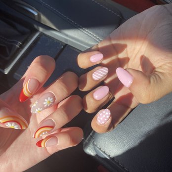 Honey Nails - Left: Gel x with designs Right: Gel manicure with designs - Nail Salons Near Me - Los Angeles, California Honey Nails - Left: Gel x with designs Right: Gel manicure with designs - Nail Salons Near Me - Los Angeles, California