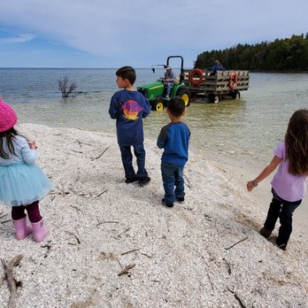 Cana Island Lighthouse - Tractor to cross to the island/lighthouse - Landmarks & Historical Buildings Near Me - Baileys Harbor, Wisconsin