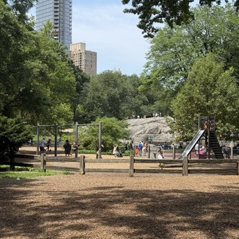 Heckscher Playground - The swings with 1 steep slide! Very scorching hot on a summer day! - Parks Near Me - New York, New York Heckscher Playground - The swings with 1 steep slide! Very scorching hot on a summer day! - Parks Near Me - New York, New York