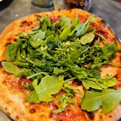 Big Island Pizza - Arugula and prosciutto 8" pizza