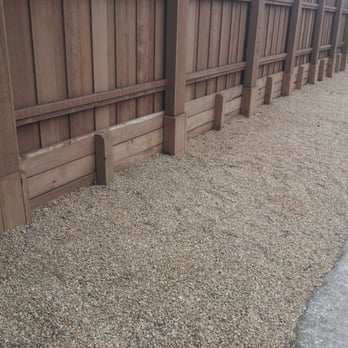 Optimal Lawn & Landscape - a row of wooden fences - Landscaping Near Me - Allen, Texas