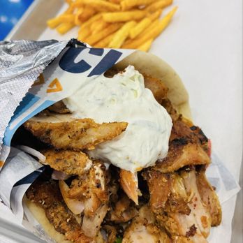 My Cousin Nick - Chicken Gyro with Tzatziki sauce with fries. Large portion. Fries crispy. Delicious Greek flavors. - Greek Near Me - Coral Gables, Florida My Cousin Nick - Chicken Gyro with Tzatziki sauce with fries. Large portion. Fries crispy. Delicious Greek flavors. - Greek Near Me - Coral Gables, Florida