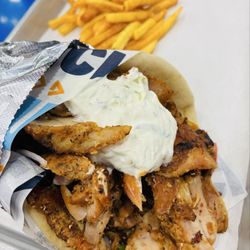 My Cousin Nick - Chicken Gyro with Tzatziki sauce with fries. Large portion. Fries crispy. Delicious Greek flavors.