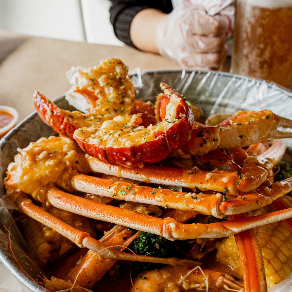 Experience the ultimate in seafood seduction with Crab du Jour's top-rated gals