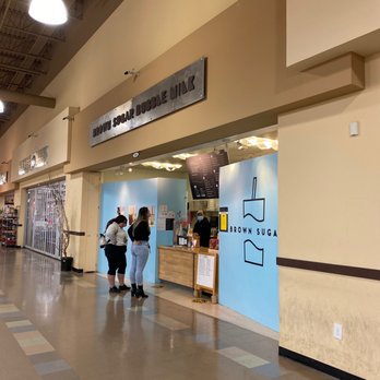 Brown Sugar Bubble Milk - two people walking through a store - Bubble Tea Near Me - Sacramento, California Brown Sugar Bubble Milk - two people walking through a store - Bubble Tea Near Me - Sacramento, California