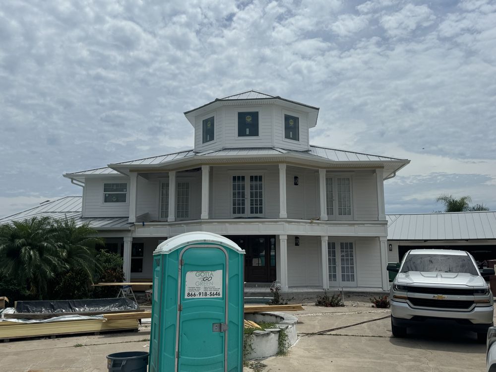 Slide of Can Am Roofing