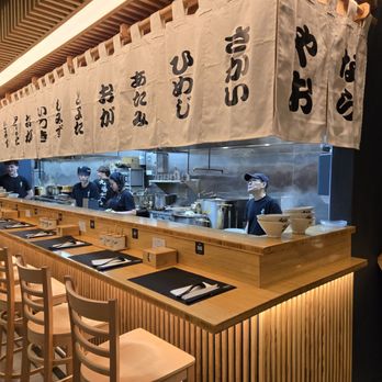 Kyuramen x TBaar - Dining area by the kitchen - Ramen Near Me - Vernon Hills, Illinois Kyuramen x TBaar - Dining area by the kitchen - Ramen Near Me - Vernon Hills, Illinois