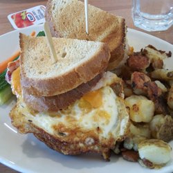Sunset Grill - Egg/cheese/ham sandwich with hash browns