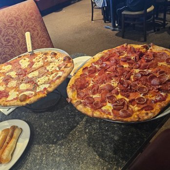 Piesanos Stone Fired Pizza - Trinity - From left to right: Garlic bread, traditional cheese and quadruple pepperoni. - Pizza Near Me - Ocala, Florida Piesanos Stone Fired Pizza - Trinity - From left to right: Garlic bread, traditional cheese and quadruple pepperoni. - Pizza Near Me - Ocala, Florida