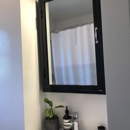 Restoration Hardware medicine cabinet installation.