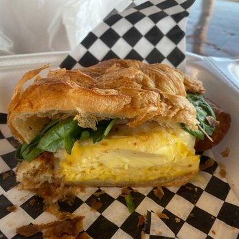 Mary's Donuts - Trash baked croissant and egg and spinach breakfast sandwich. YUMMMMMMM - Donuts Near Me - Lakeside, California